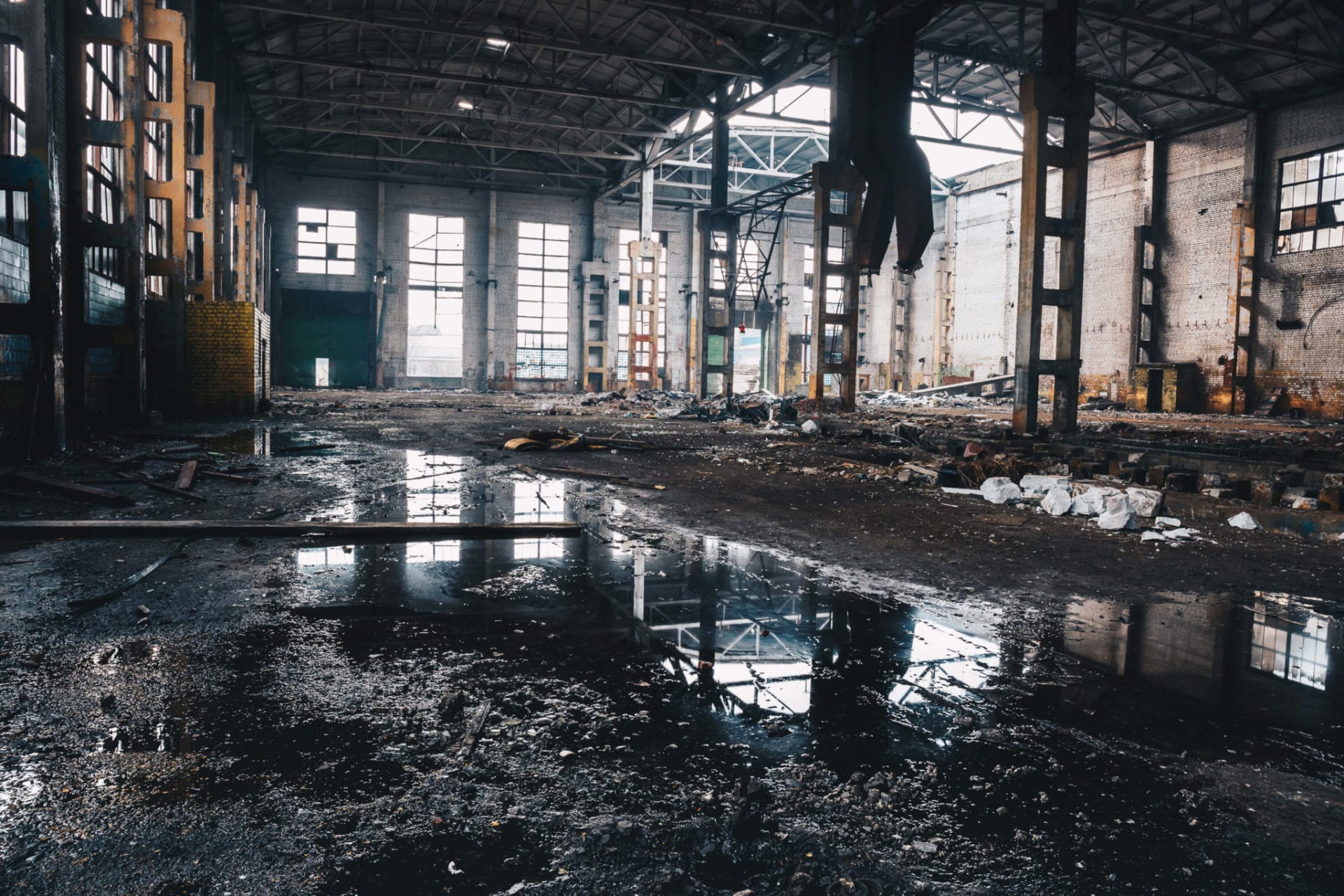 Abandoned ruined industrial factory building.